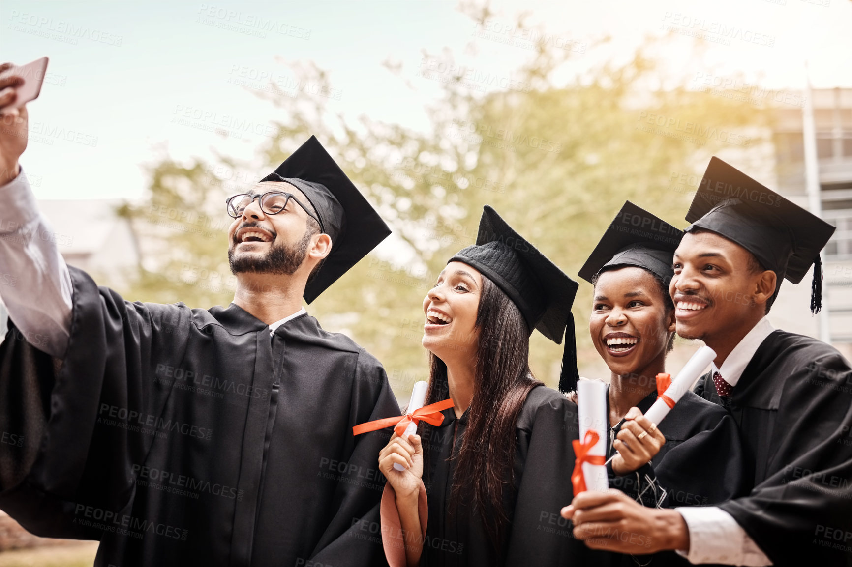 Buy stock photo Selfie, graduation and college or university friends with diploma and happiness outdoor. Diversity men and women celebrate education achievement, success and future at school event as graduate memory