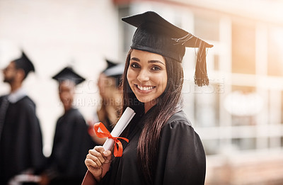 Buy stock photo Woman, graduation and portrait of a college student with a diploma and smile outdoor. Female person excited to celebrate university achievement, education success and future at school graduate event
