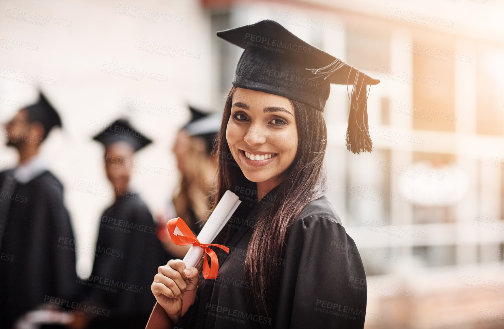 Buy stock photo Woman, graduation and portrait of a college student with a diploma and smile outdoor. Female person excited to celebrate university achievement, education success and future at school graduate event