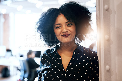 Buy stock photo Portrait of an attractive young female designer smiling and in good spirits at the office