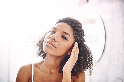 Buy stock photo Woman, skincare and natural beauty with mirror for grooming or morning routine at home. Young, female person or reflection with facial or hairstyle for soft skin, dermatology or hygiene in bathroom