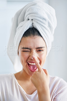 Buy stock photo Beauty, cream and portrait of woman winking in bathroom of home for morning skincare routine. Finger, lotion and nose with happy person for fun in towel at apartment for cosmetics or dermatology