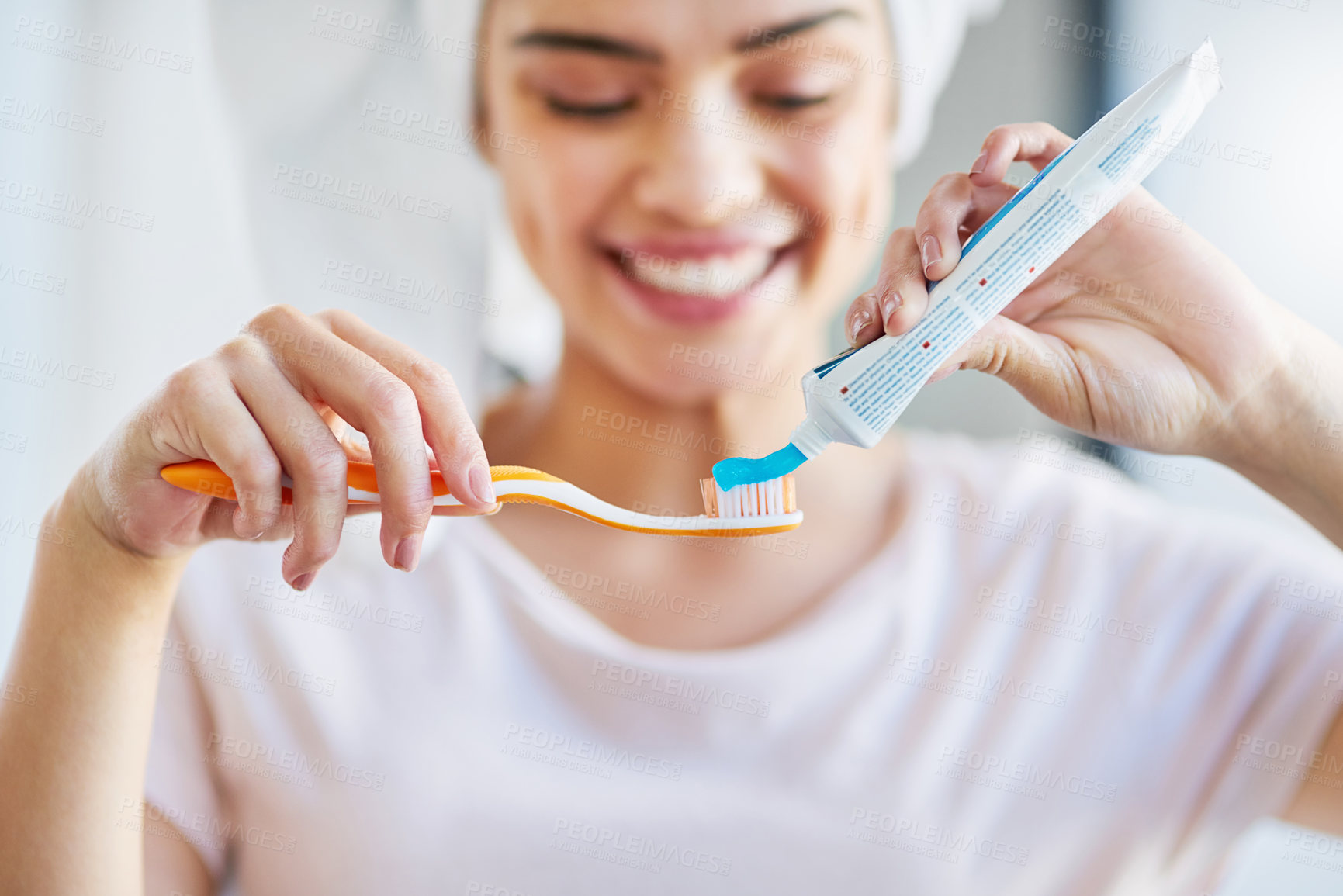 Buy stock photo Hands, dental care and toothbrush with toothpaste for cleaning teeth or oral hygiene in bathroom. Woman, morning routine and wellness for healthy mouth, gums and fresh breath in grooming at home