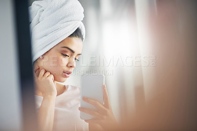 Buy stock photo Shot of a beautiful young woman taking selfies in the bathroom at home