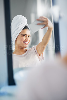 Buy stock photo Woman, happy and mirror with selfie in home for skincare, morning routine and social media update. Cosmetics, influencer and towel with digital photography in bathroom for online, post or dermatology