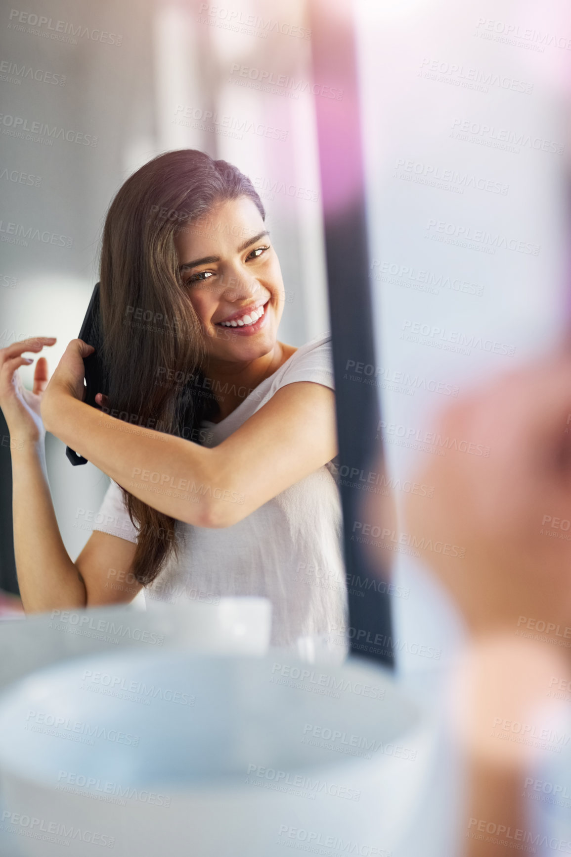 Buy stock photo Woman, mirror and hairbrush in home portrait, grooming and morning for getting ready in bathroom. Female person, cosmetics tool and brushing for hairstyle, reflection and treatment for healthy growth