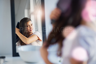 Buy stock photo Woman, mirror and hairbrush for beauty in home, grooming and morning in bathroom. Female person, cosmetics tool and hair care for hairstyle, reflection and treatment for healthy growth or texture