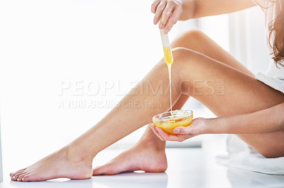 Buy stock photo Waxing, legs and woman in bathroom for skincare, epilation and hair removal at home. Female person, self care and  application with hands for treatment, cosmetics and beauty or smooth skin in morning