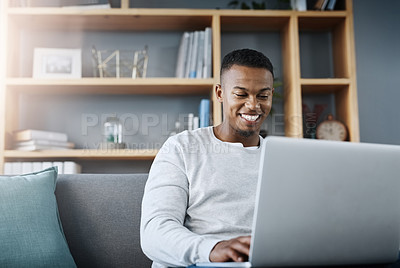 Buy stock photo Happy black man with laptop, streaming online and relax in living room, subscription service with internet and smile. Technology, connectivity and male person chill at home watching tv show or film