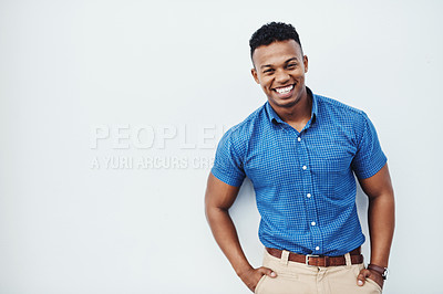 Buy stock photo Studio portrait of a young creative businessman posing against a grey background