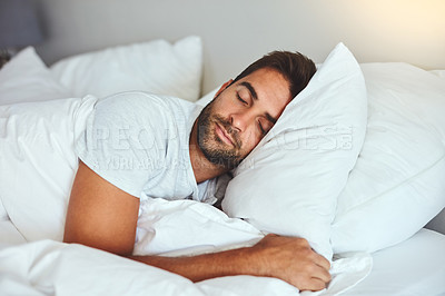 Buy stock photo Man, sleeping and bed in morning rest for healthy wellness, peace and quiet on comfort pillow at home. Tired or exhausted male person asleep or dreaming on peaceful holiday or weekend in the bedroom