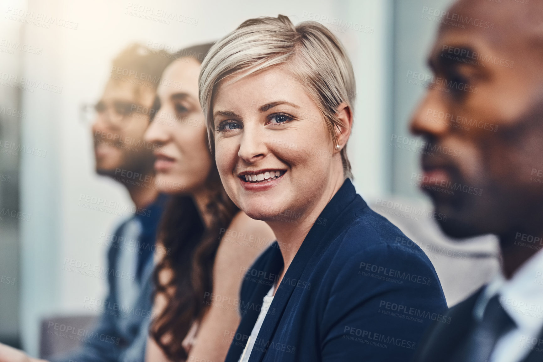 Buy stock photo Shot of corporate businesspeople in the workplace
