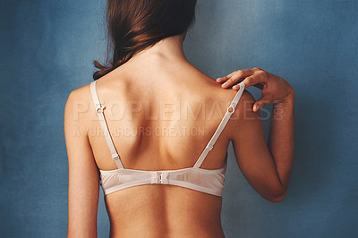 Women Taking Off Bra Stock Images and Photos - PeopleImages