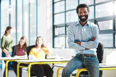 Buy stock photo Cropped portrait of a businessman in an office with his colleagues in the background