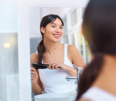 Buy stock photo Woman, hair brush and haircare in mirror, smile and beauty or morning routine in bathroom. Female person, shampoo and keratin treatment results, dermatology and cosmetics for care at home