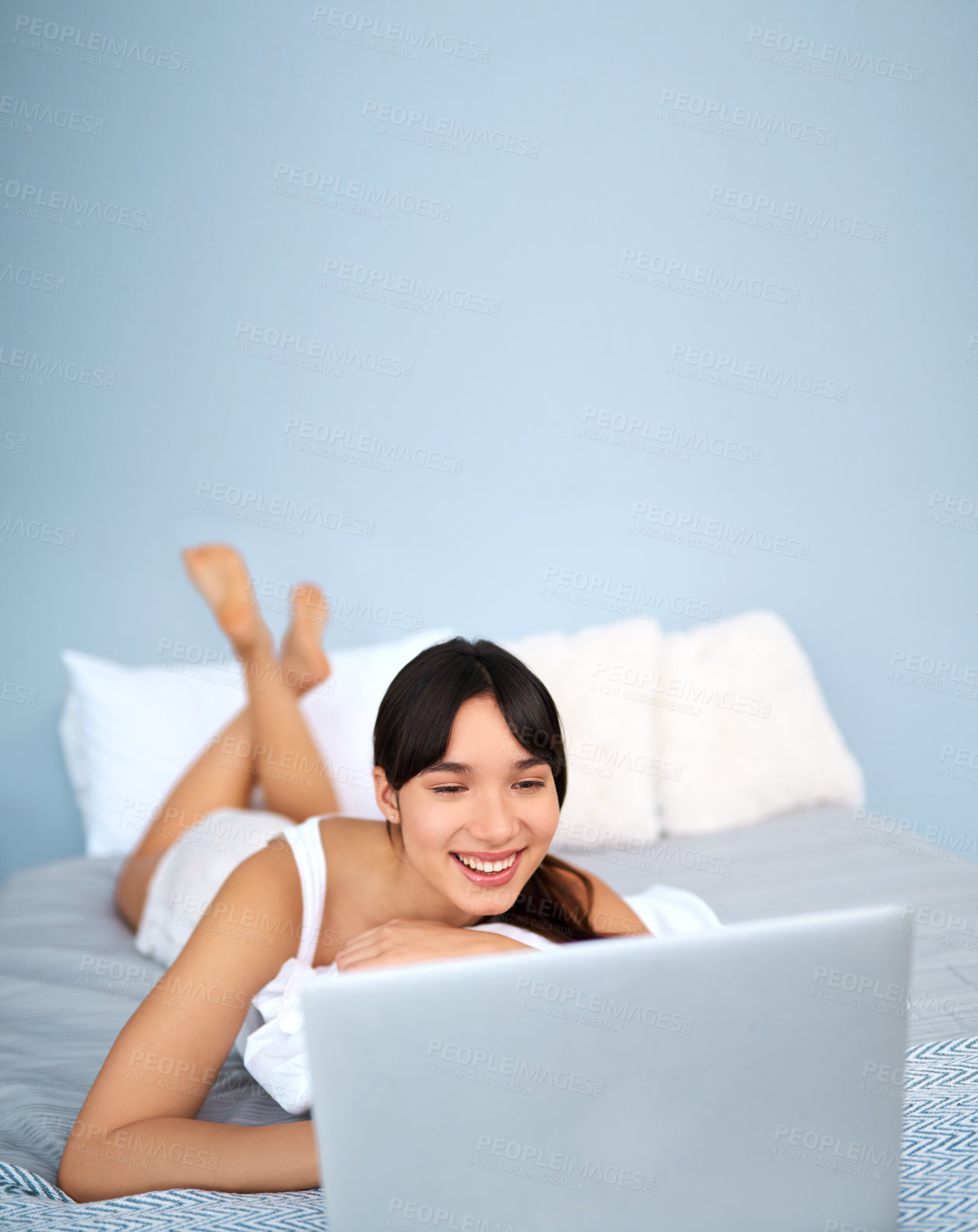 Buy stock photo Woman, home and happy with laptop in bed for streaming movies and series on website. Female person, smile and online with technology for internet, communication and entertainment in bedroom. 