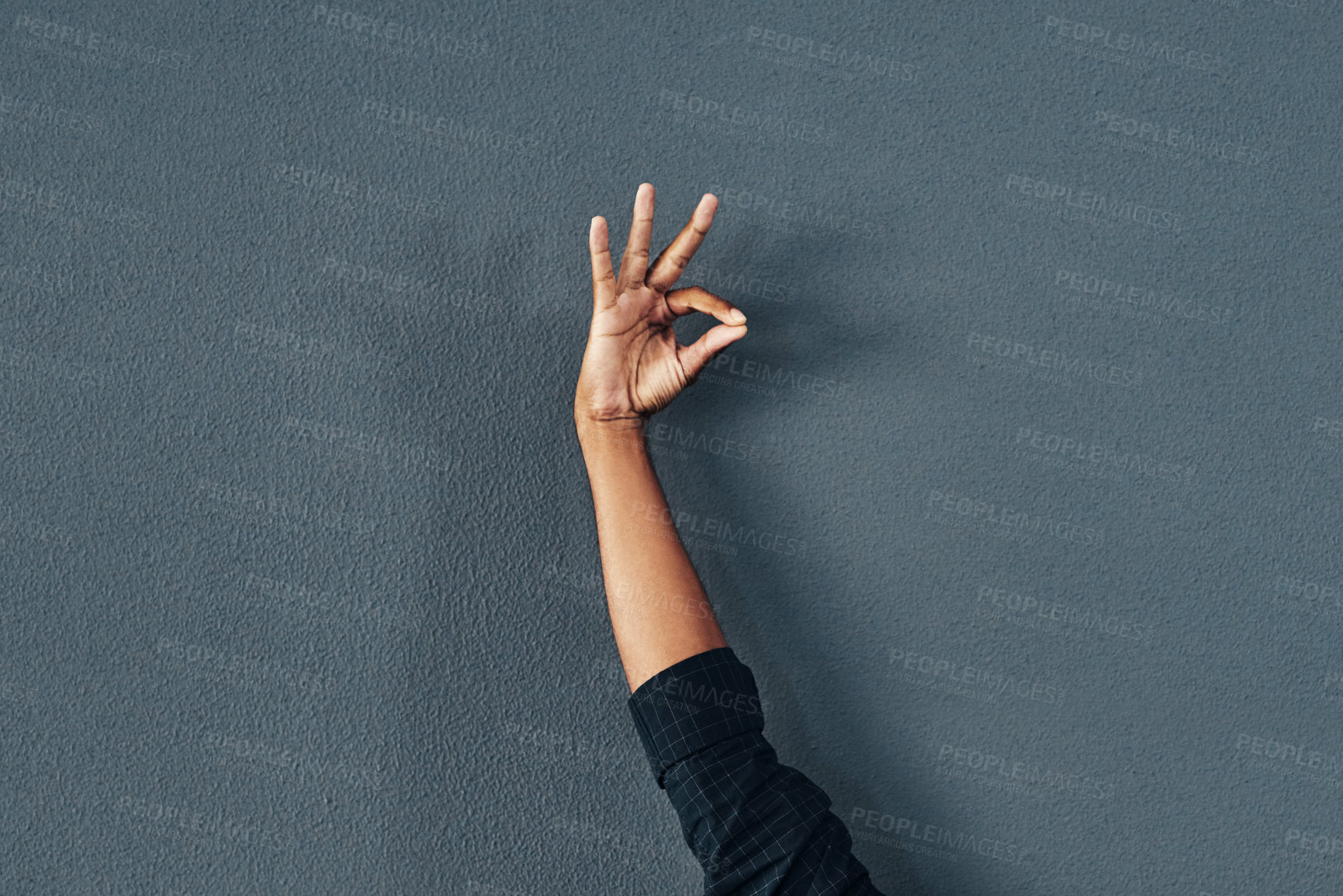 Buy stock photo Studio shot of an unrecognizable woman gesturing against a grey background