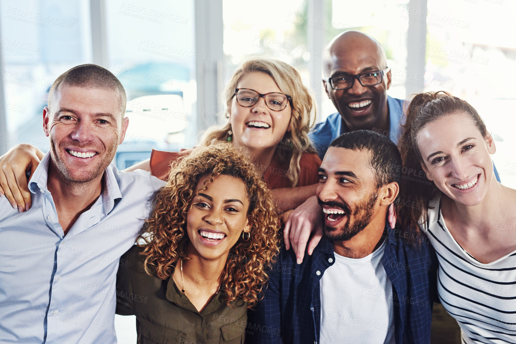 Buy stock photo Business people, hug portrait and team with diversity, smile and working together for professional collaboration. Support, solidarity and community in office, workplace and employee group about us