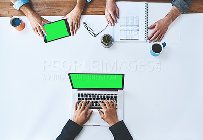 Buy stock photo Cropped shot of businesspeople using wireless devices with green screens during a meeting at work