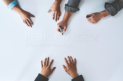 Buy stock photo Mockup, writing and business analyst team planning company growth strategy together as teamwork or collaboration. Brainstorming, discussion and hands of corporate people in a development meeting