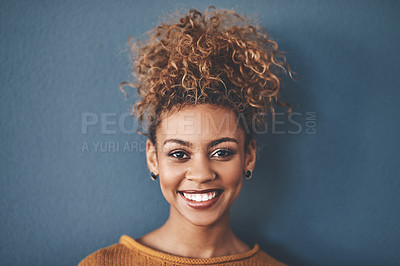 Buy stock photo Face of a happy, confident and beautiful black woman with a positive mindset a bright smile. Portrait of a carefree, pretty and attractive African American female, isolated on a studio background