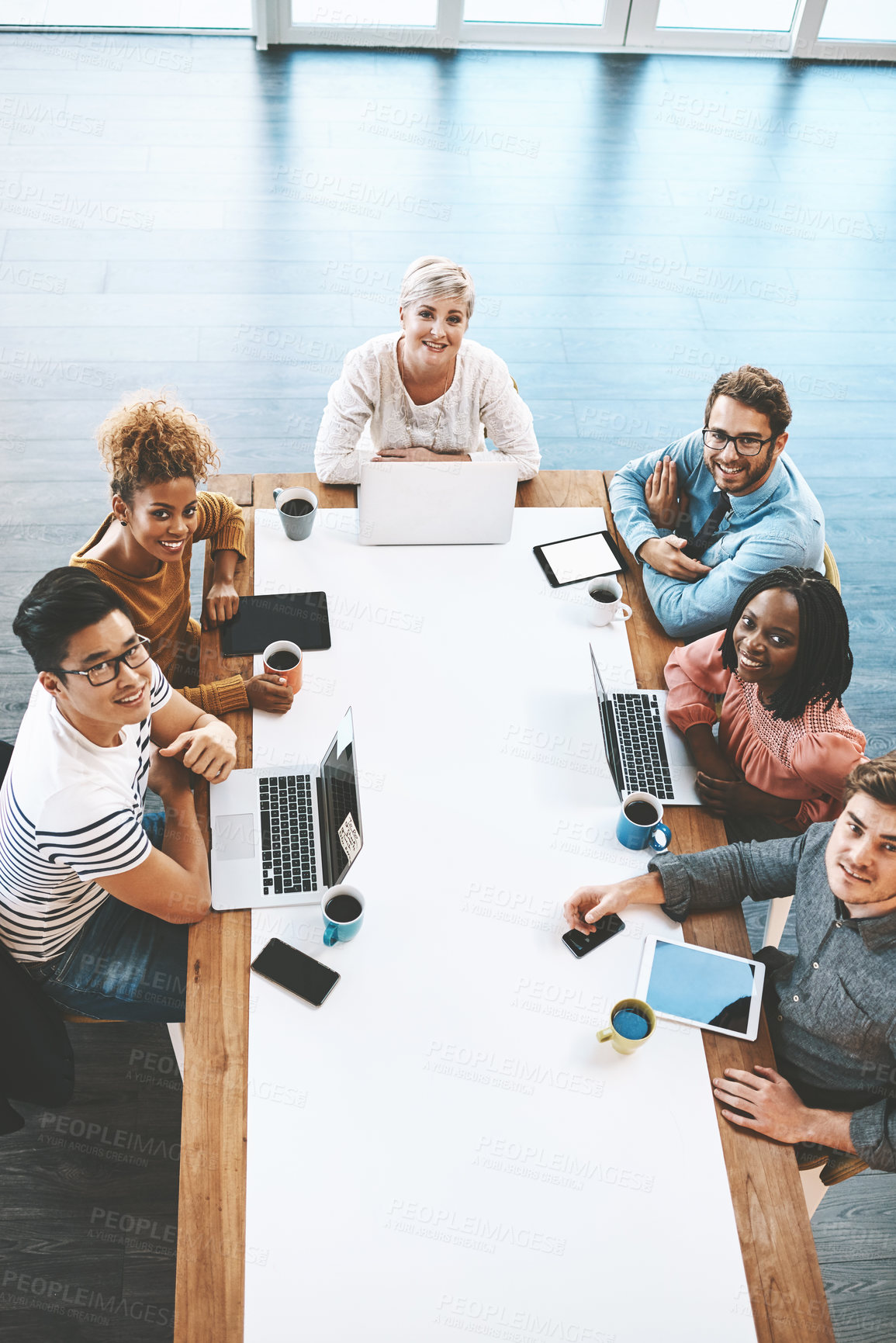 Buy stock photo Meeting, above or portrait of people in startup for team planning, company growth strategy or collaboration. Technology, designers or creative workers in office for project development discussion