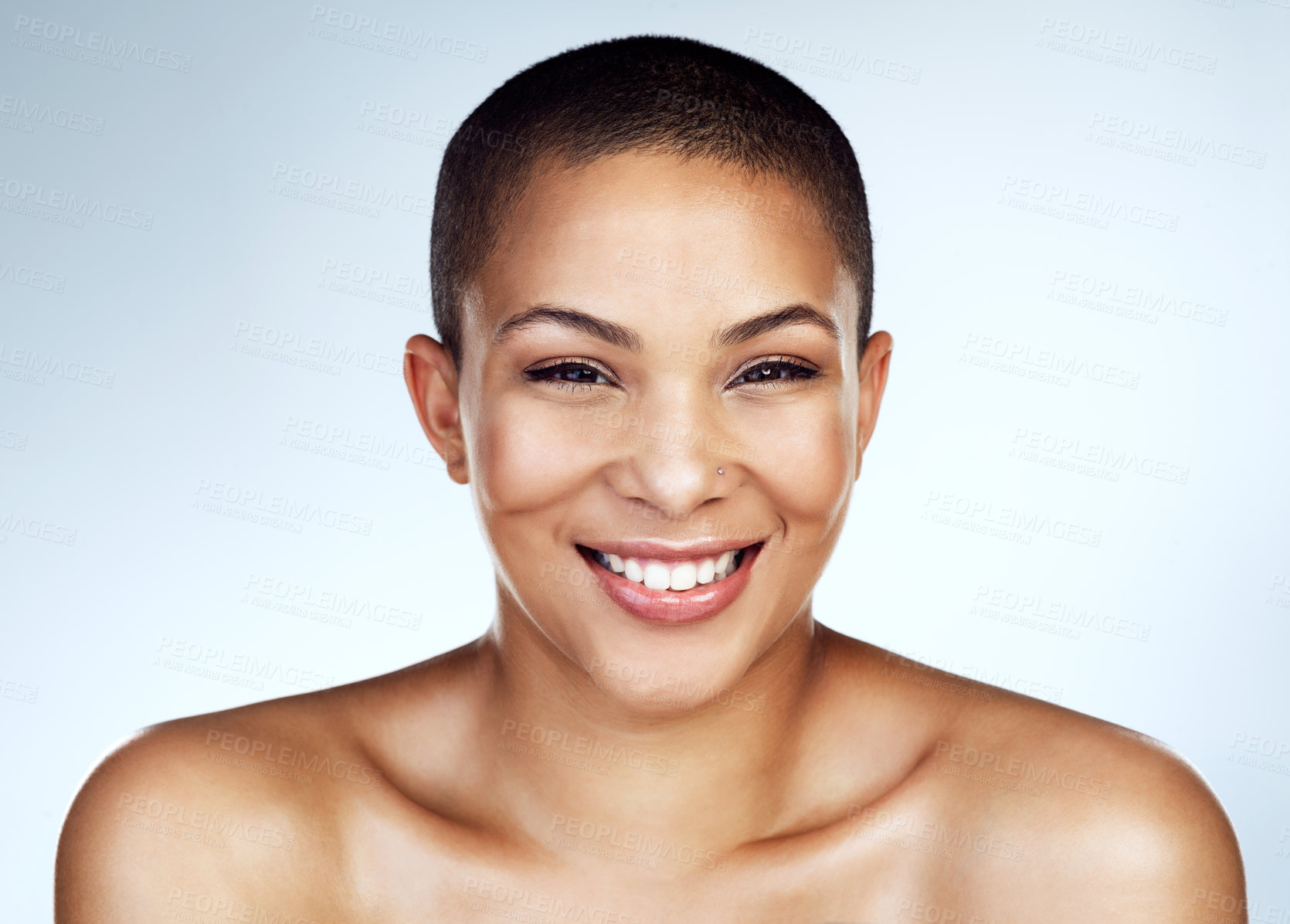 Buy stock photo Beauty, portrait and smile with natural black woman in studio on blue background for wellness. Aesthetic, cosmetics and face of confident or happy model with clear skin for dermatology or vitamin c