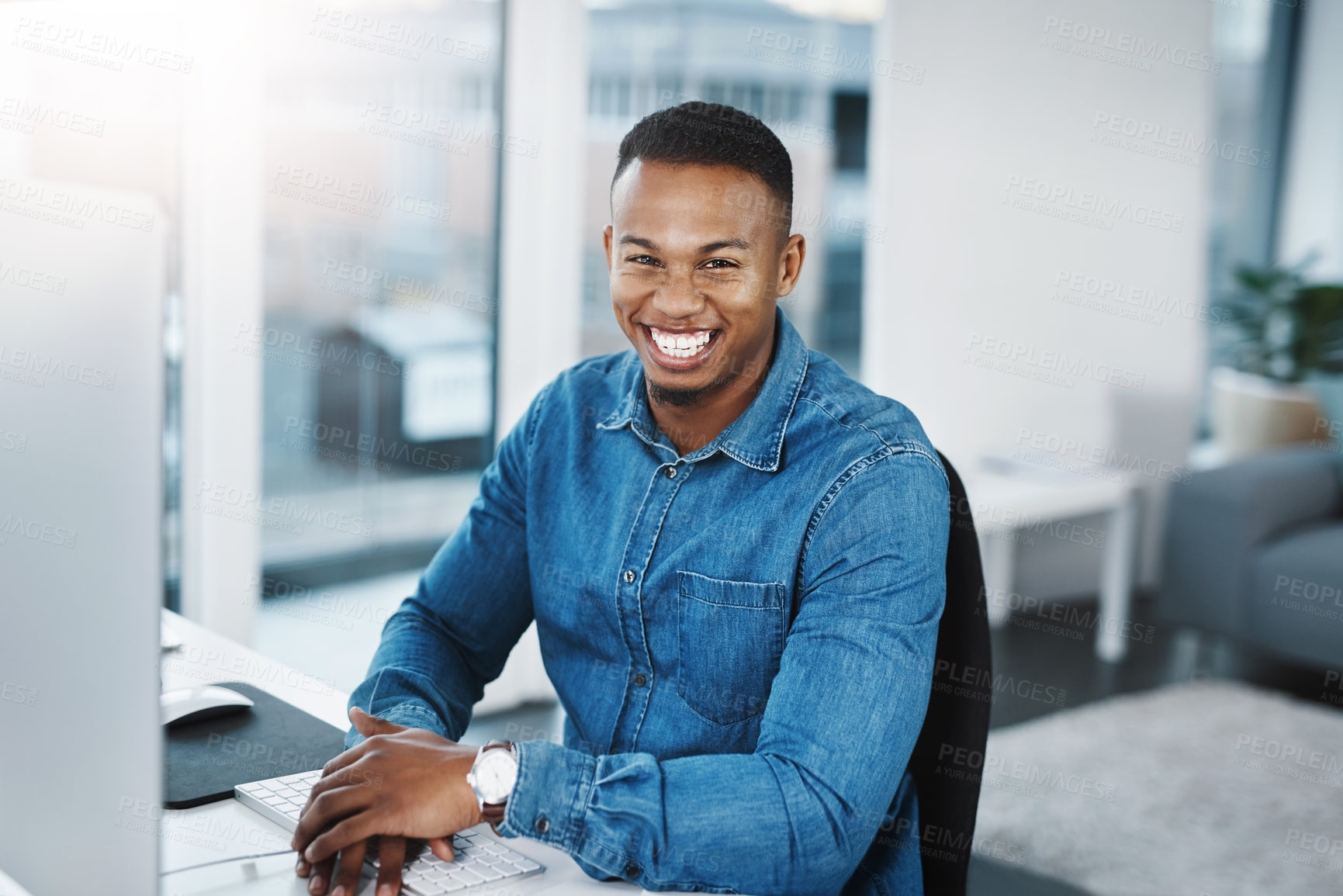 Buy stock photo Portrait, smile and black man by computer in office, workspace and desk happy in creative career. Happiness, internship and journalist with technology for typing, research and internet for working