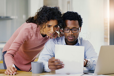 Buy stock photo Couple, document and finance in budget planning, bills or expenses together in the kitchen at home. Serious man and woman person working on paperwork in financial, mortgage or investment strategy