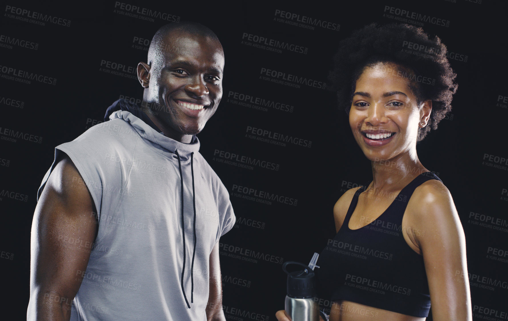 Buy stock photo Black people, portrait and sports athlete with personal trainer or sweating, dark background or coaching. Man, woman and face or training together for healthy confidence or gym, studio or teamwork