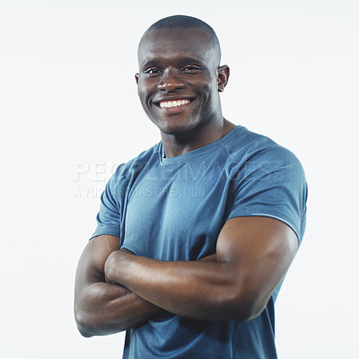 Buy stock photo Black man, smile and portrait with strong arms crossed and confidence in a studio. White background, African male person and happy model face with pride, active style and fitness fashion isolated