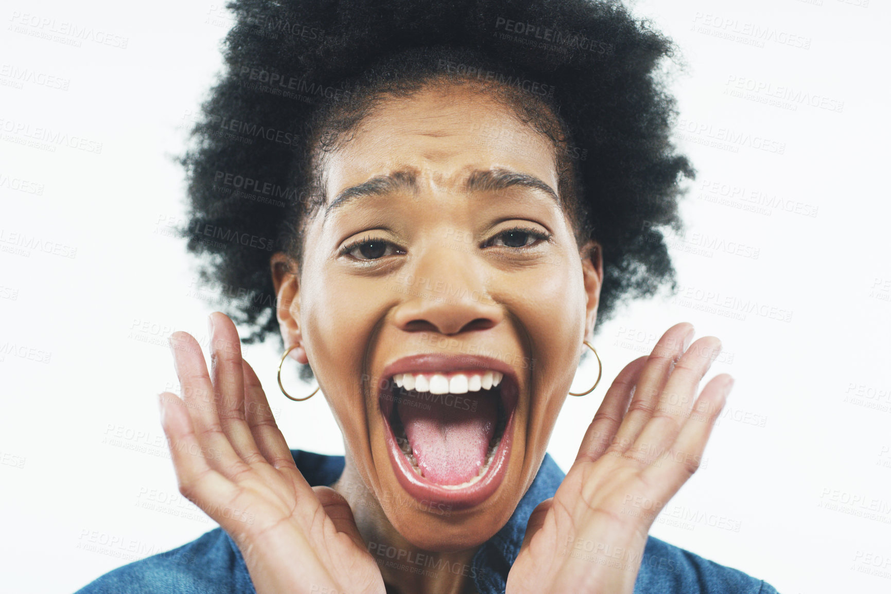 Buy stock photo Studio shot of an attractive young woman looking surprised and posing with her mouth open against a grey background