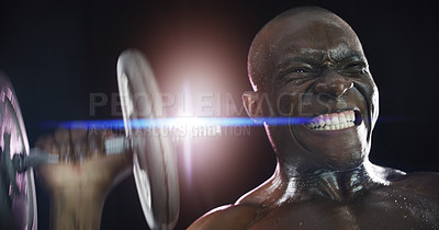 Buy stock photo Studio shot of a young sportsman working out using dumbbells against a dark background