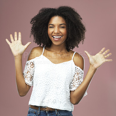 Buy stock photo Portrait, hands and excited woman in studio for wave, greeting and happiness on pink background. Welcome, person and hand gesture for hello, goodbye and friendly expression with casual fashion