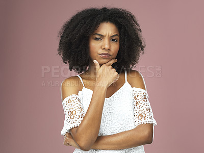 Buy stock photo Thinking, black woman and portrait for confused in studio with question, doubt and decision by problem solving for solution. African, female person and thoughtful with choice on pink background