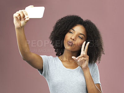 Buy stock photo Female influencer, selfie and peace sign in studio for social media, photography and status update on pink background. Black woman, pout and networking online for followers, communication and tech