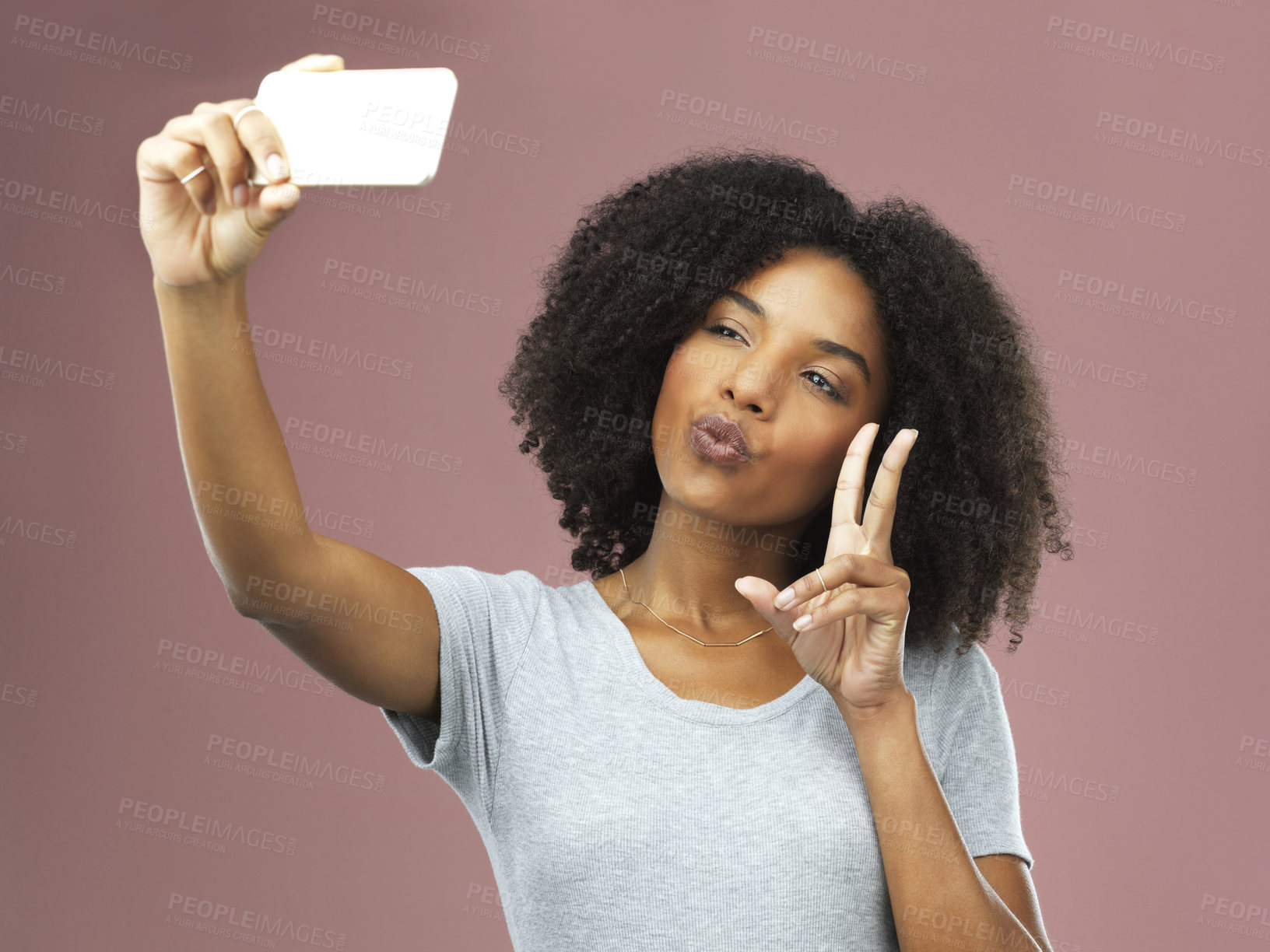 Buy stock photo Female influencer, selfie and peace sign in studio for social media, photography and status update on pink background. Black woman, pout and networking online for followers, communication and tech