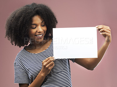 Buy stock photo Mockup, smile and woman with poster in studio for advertising, design and board for marketing. Female person, happy and paper placard for promotion, announcement and information on pink background