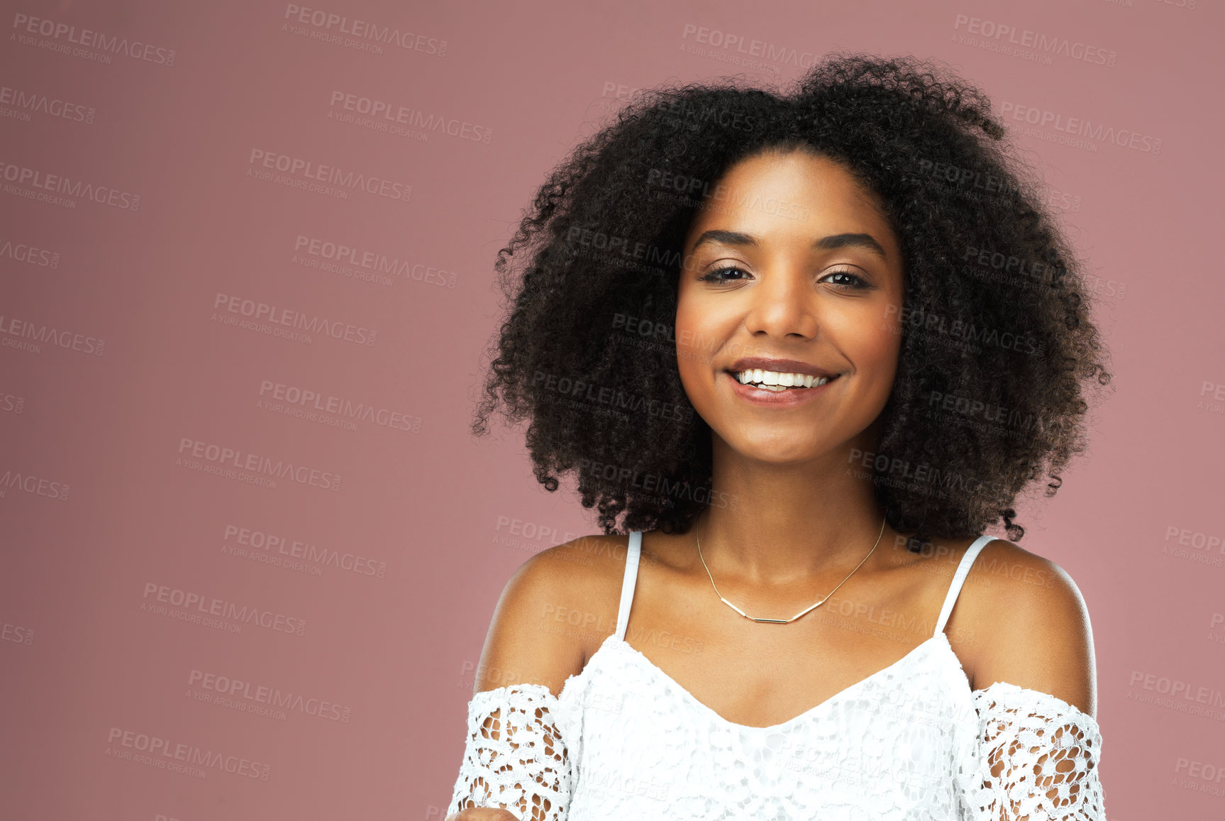 Buy stock photo Afro, haircare and portrait of black woman, texture and smile for hairstyle, growth and health of hair. Pink background, face and African girl with happiness for treatment in studio and salon