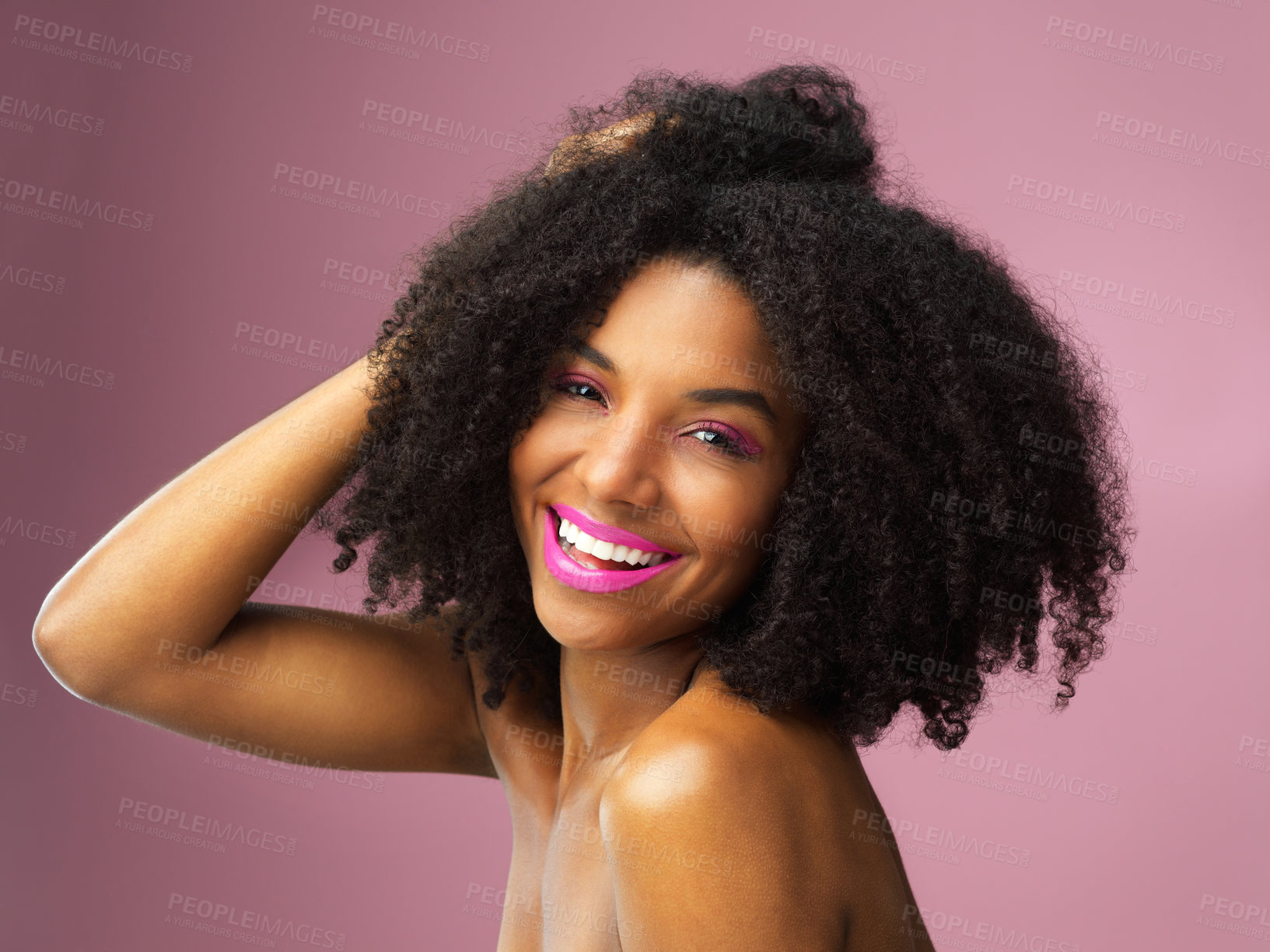 Buy stock photo Hair care, face and smile of black woman with afro in studio isolated on pink background. Hairstyle portrait, makeup cosmetics and funny African female model with salon treatment for beauty lipstick.