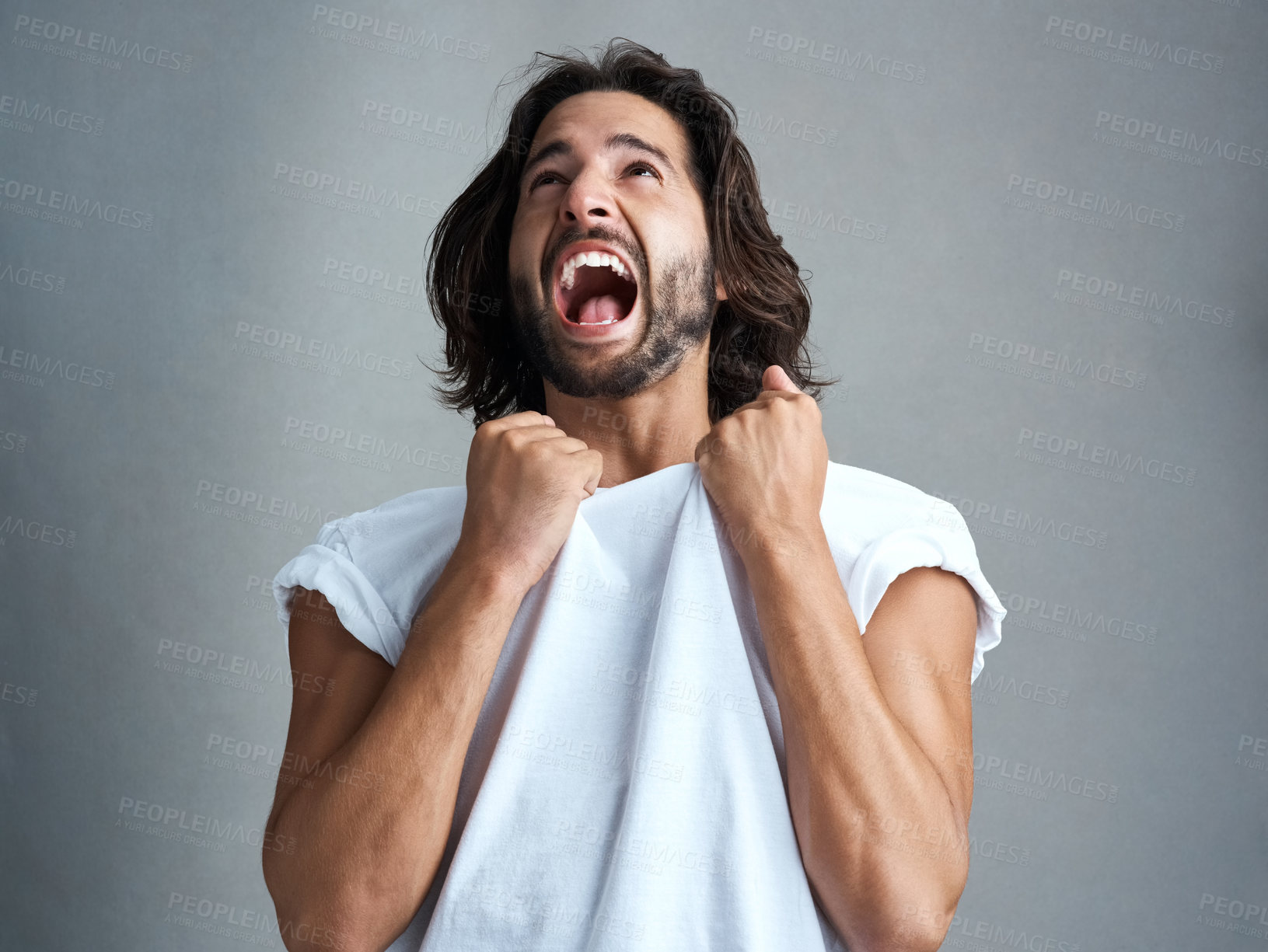 Buy stock photo Studio, man and scream with pulling of tshirt for bad news, anxiety and stress on gray background. Frustrated, male person and expression with screaming for ptsd trauma, panic attack or mental health