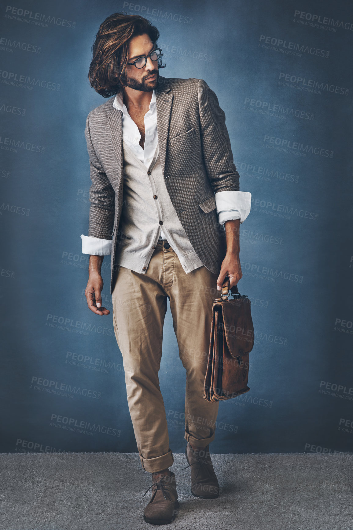 Buy stock photo Fashion, man and studio for business style, suitcase and bag for walking commute on background. Smart casual, professional and trendy clothes for job, travel and luggage accessory for career