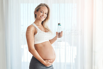 Buy stock photo Portrait of a happy pregnant woman getting ready to workout at home