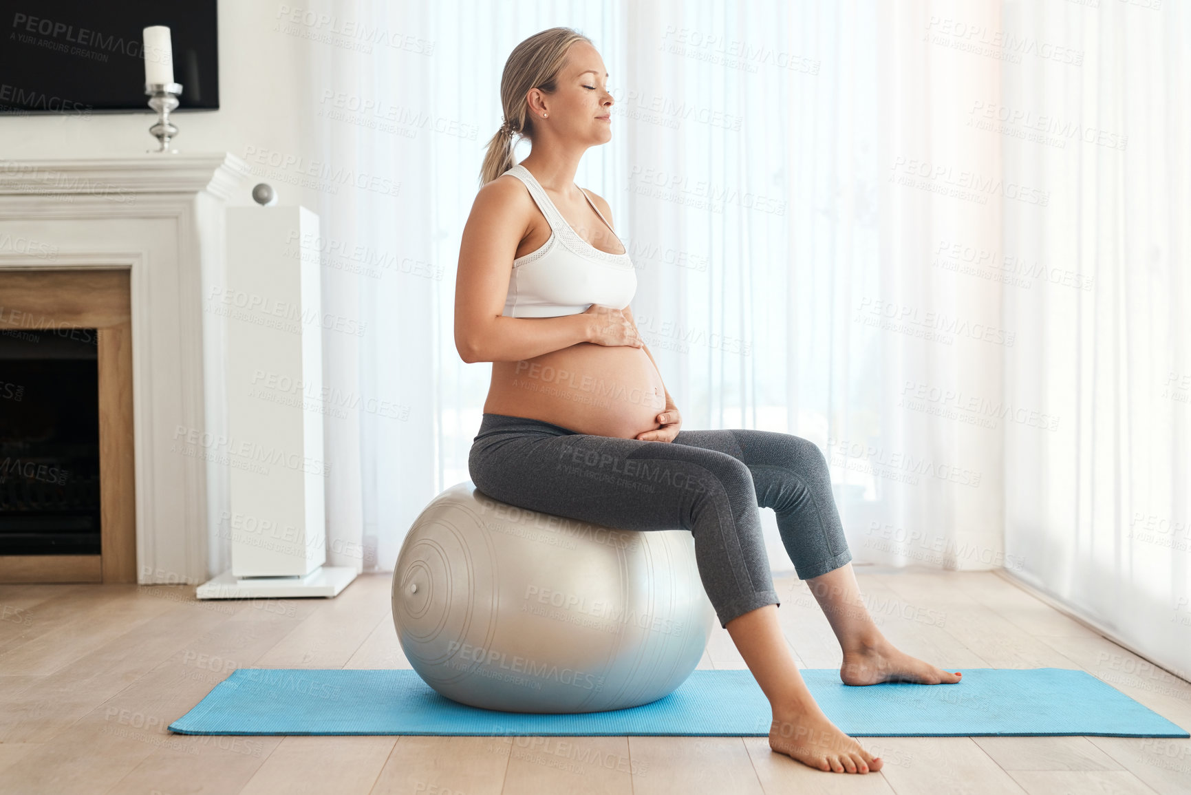 Buy stock photo Pregnant, woman and exercise ball in home for wellness, labour preparation and posture or maternity leave. Pregnancy pilates, back relief and encouraging baby movement, eyes closed and relaxed mother