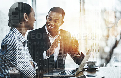 Buy stock photo Cropped shot of two businesspeople working together on a laptop in an office