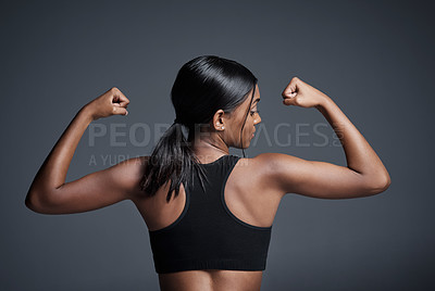 Buy stock photo Sports, workout and woman flexing back in studio isolated on a black background. Strong flex, muscle and female athlete with bicep, arm strength or bodybuilder training, fitness and healthy exercise.