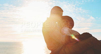 Buy stock photo Shot of a happy young couple enjoying a romantic day outdoors