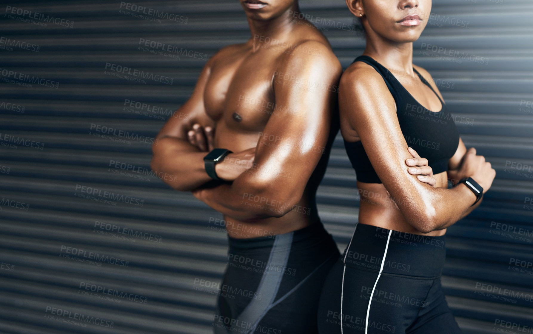 Buy stock photo Closeup shot of a sporty couple standing together against a grey background