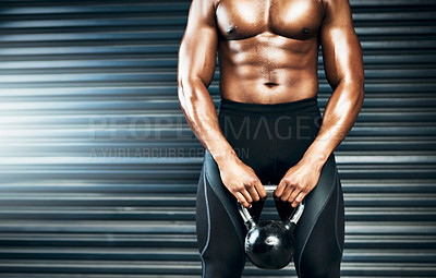 Buy stock photo Closeup shot of a muscular man lifting weights against a grey background