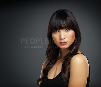 Buy stock photo Asian, woman and portrait on studio backdrop for beauty, cosmetics and  skincare. Female makeup artist, dermatology and makeover by dark background for glow, healthy skin and spa treatment for mockup